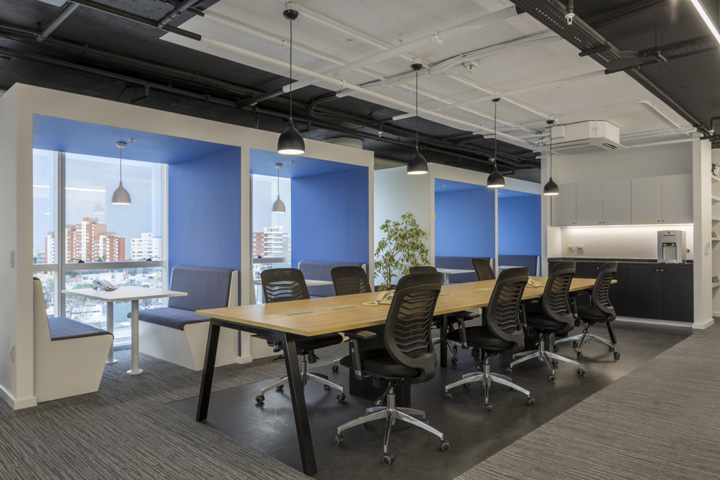 傳媒公司開放式辦公區(qū)布置實景圖 傳媒公司開放式辦公區(qū)布置實景圖