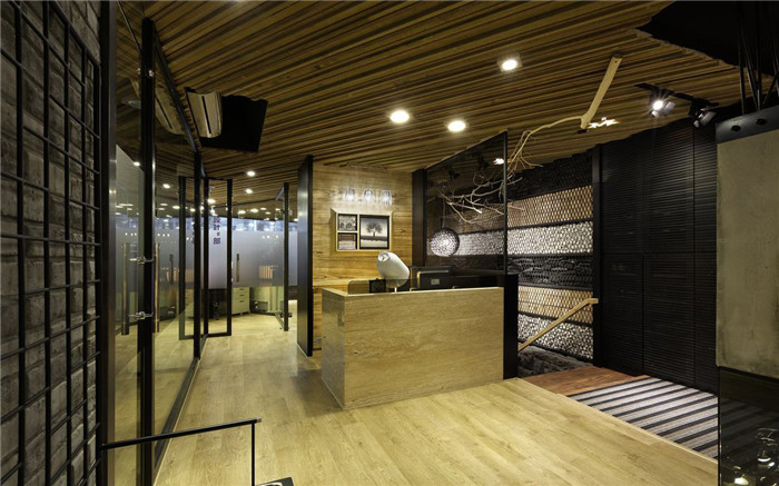 鄭州辦公室設(shè)計(jì)裝修公司分享靜謐辦公室前臺裝修方案