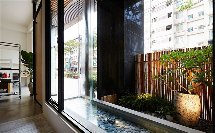 100平LOFT極簡風辦公室裝修改造室內水景設計案例