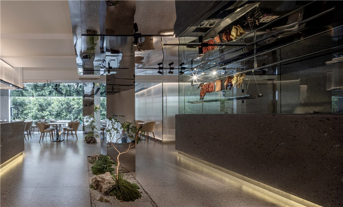 餐廳引導吧臺裝修設計-鄭州宏鈺堂分享綠色現代風港式茶餐廳裝修設計方案